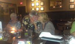 a birthday dinner kiss