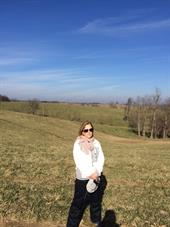 A woman outstanding in her field